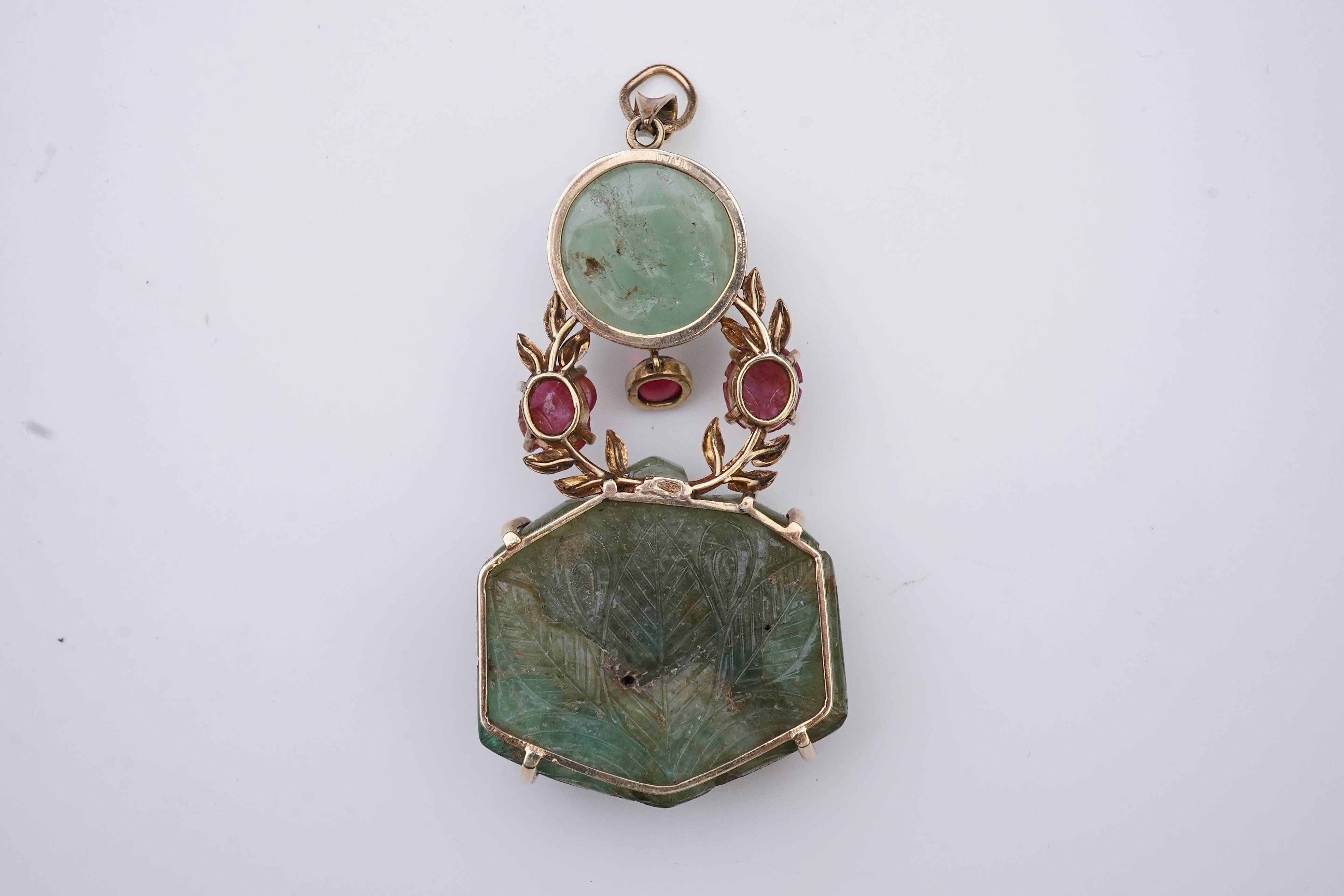 An unusual Mughal-style emerald, ruby and synthetic ruby pendant, second half 20th century